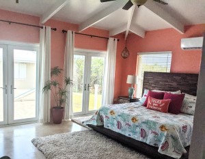 Judiths Fancy Vacation Rentals St Croix pink bedroom