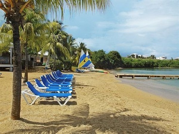 Chenay Bay LOUNGES ON BEACH